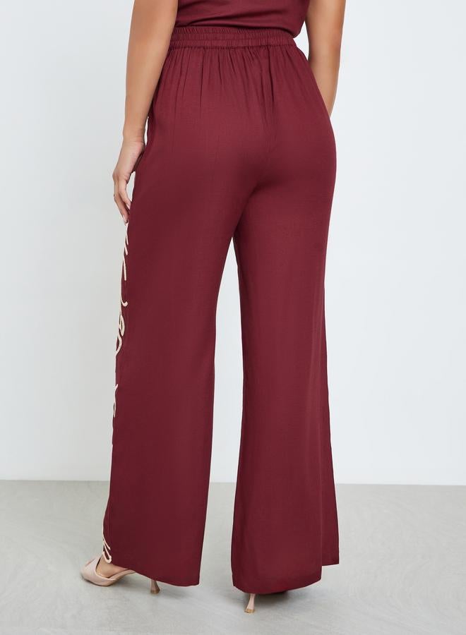 ستايلي بنطال بأرجل واسعة وتفاصيل مُطرّزة - Image 3